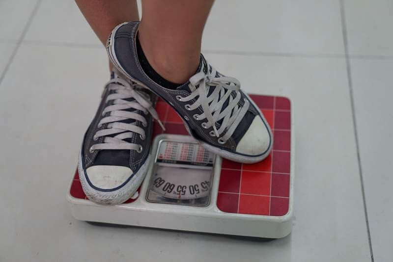 weighing-machine-sneakers-weight
